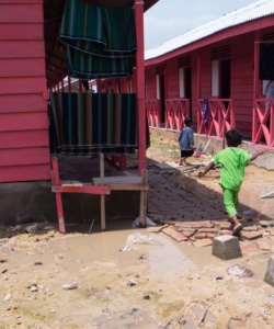 Rohingya children run around Kuala Langsa camp in Aceh, Indonesia.